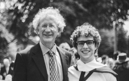 Graduating senior Adam Maraschky with his senior essay advisor, tutor (and former Johnnie) Mr. Burke. (Photo by Anyi Guo)