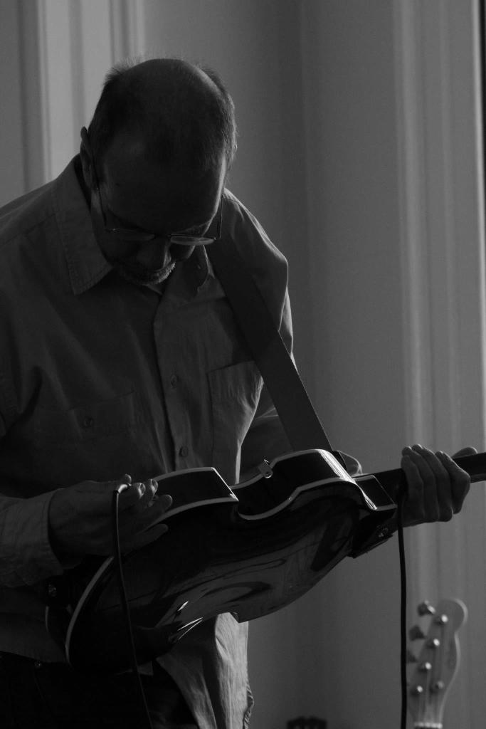 Henry Higuera, St. John's tutor at our annual faculty folk concert, Be Gone Dull Care